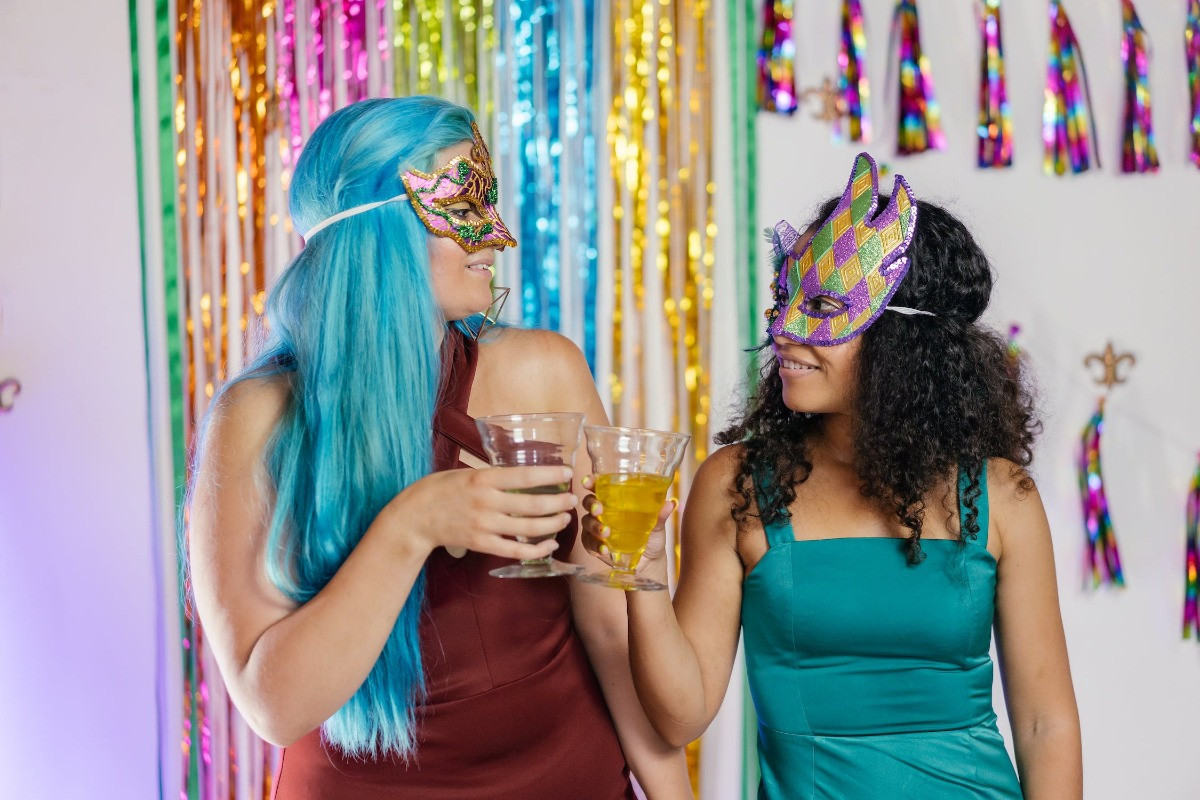 women celebrating Mardi Gras at a party
