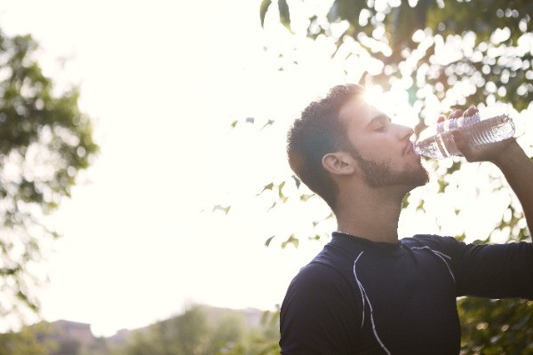 Man Drinking Water after workout